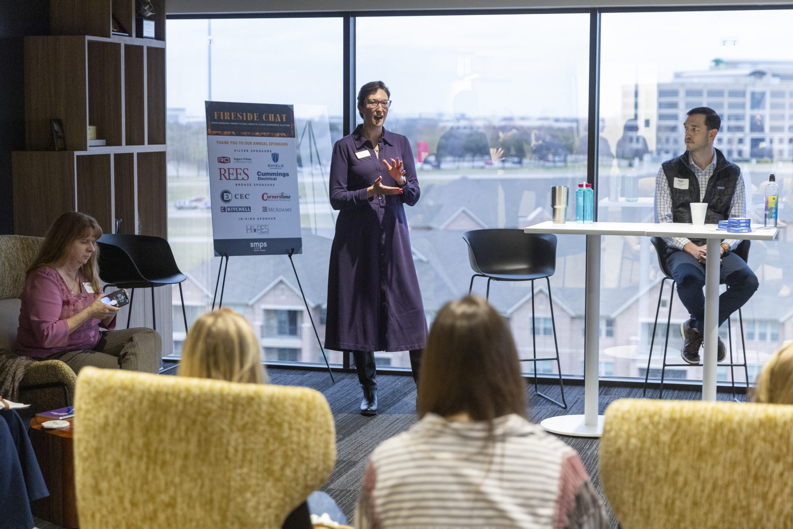 Sarah Kinard speaking with AEC professionals during an industry program